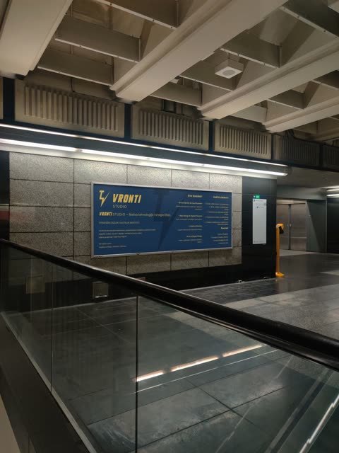 Vronti Studio billboard in an underground passage