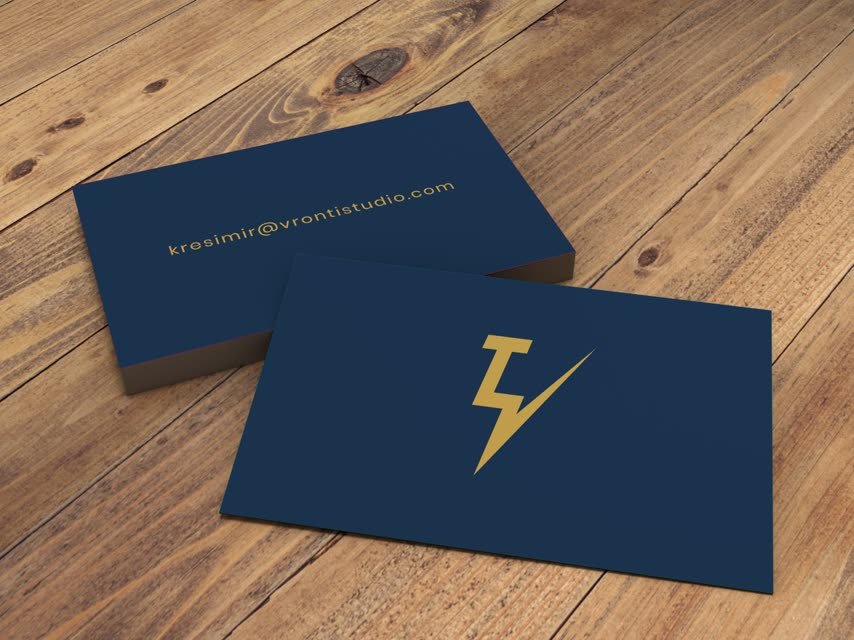 Vronti Studio business cards, navy with the gold lightning mark and kresimir@vrontistudio.com